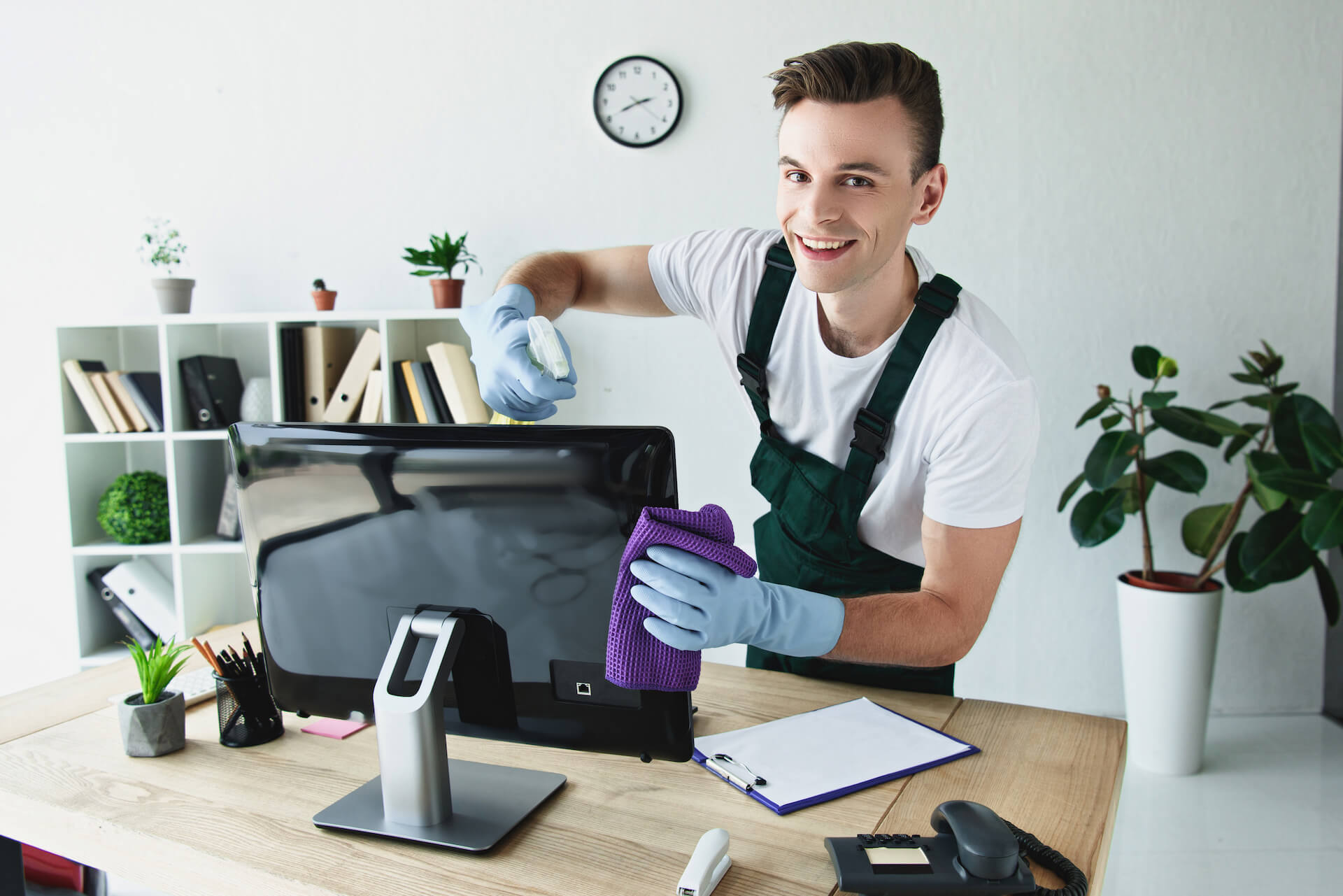 handsome-young-cleaner-in-rubber-gloves-cleaning-c-2021-09-01-01-56-48-utc.jpg